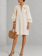 White V-neck Lantern-sleeve Mini Dress Featuring Striking Floral