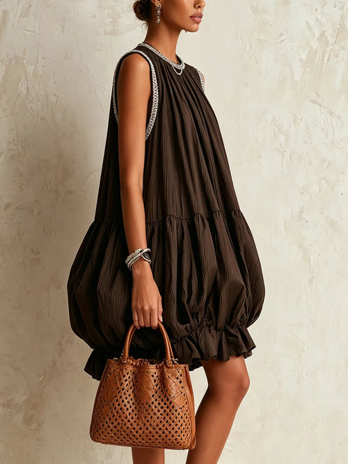 Brown sleeveless mini dress with a bubble hem