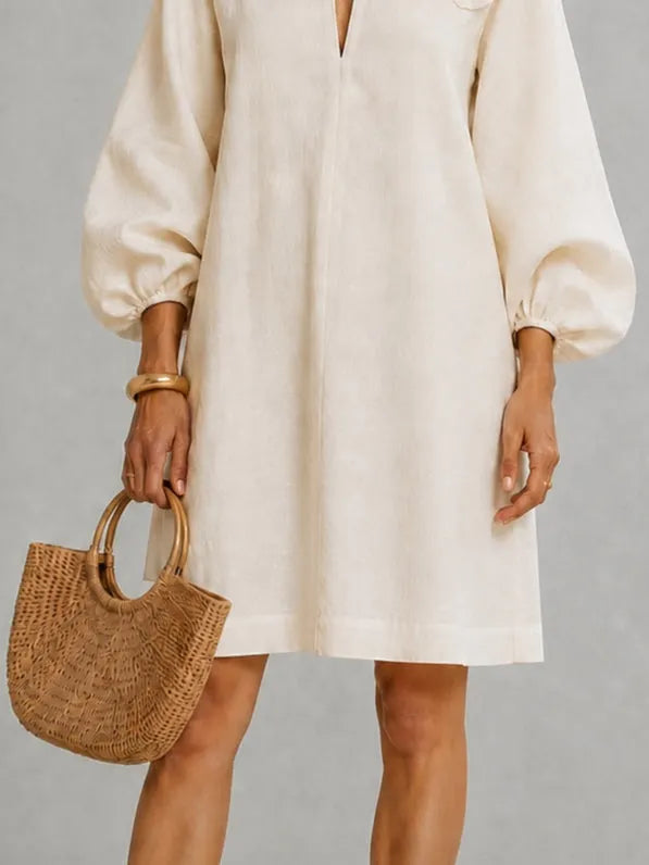 White V-neck Lantern-sleeve Mini Dress Featuring Striking Floral