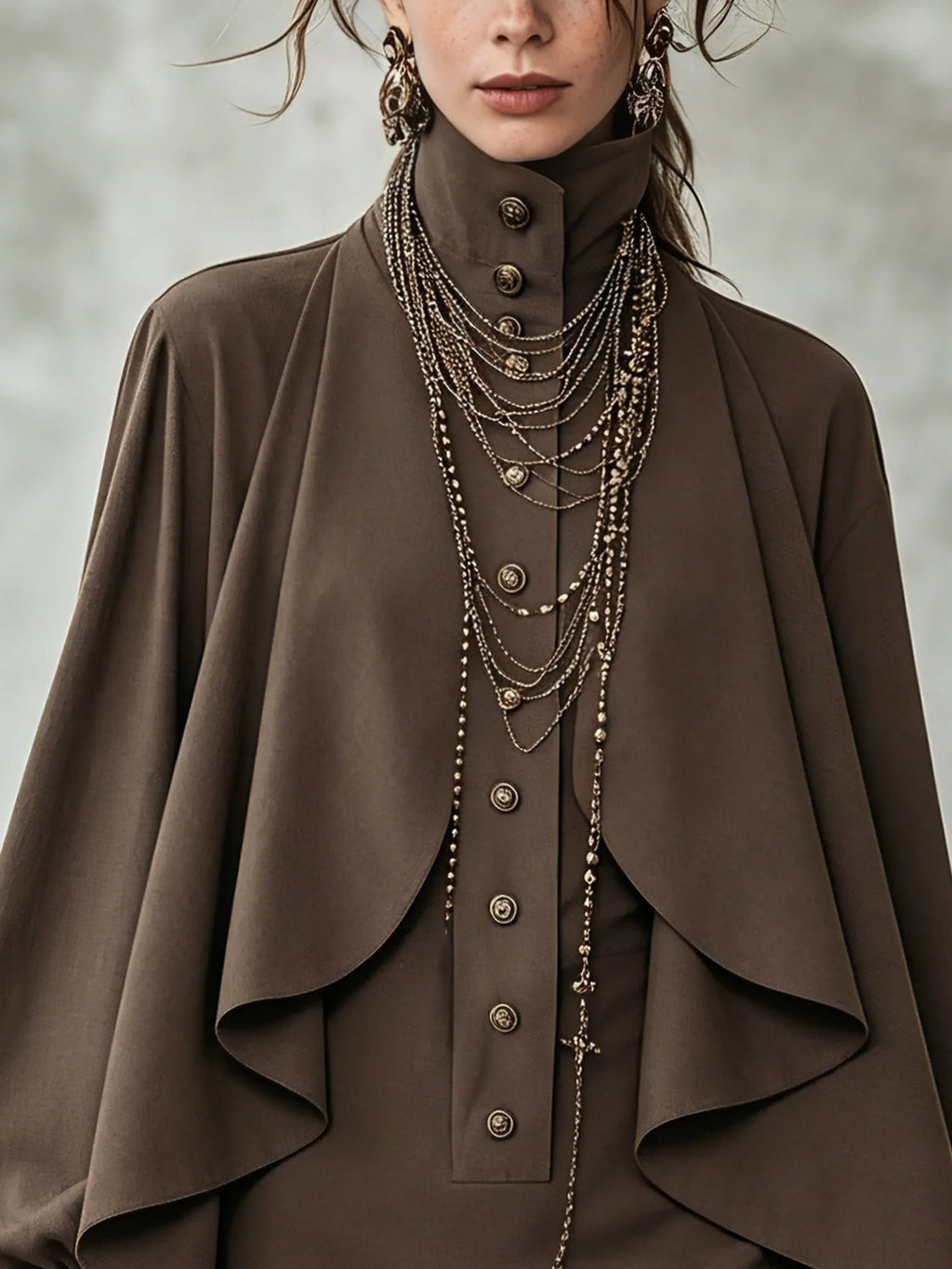 Chocolate high-neck mini dress with cape-style paneling